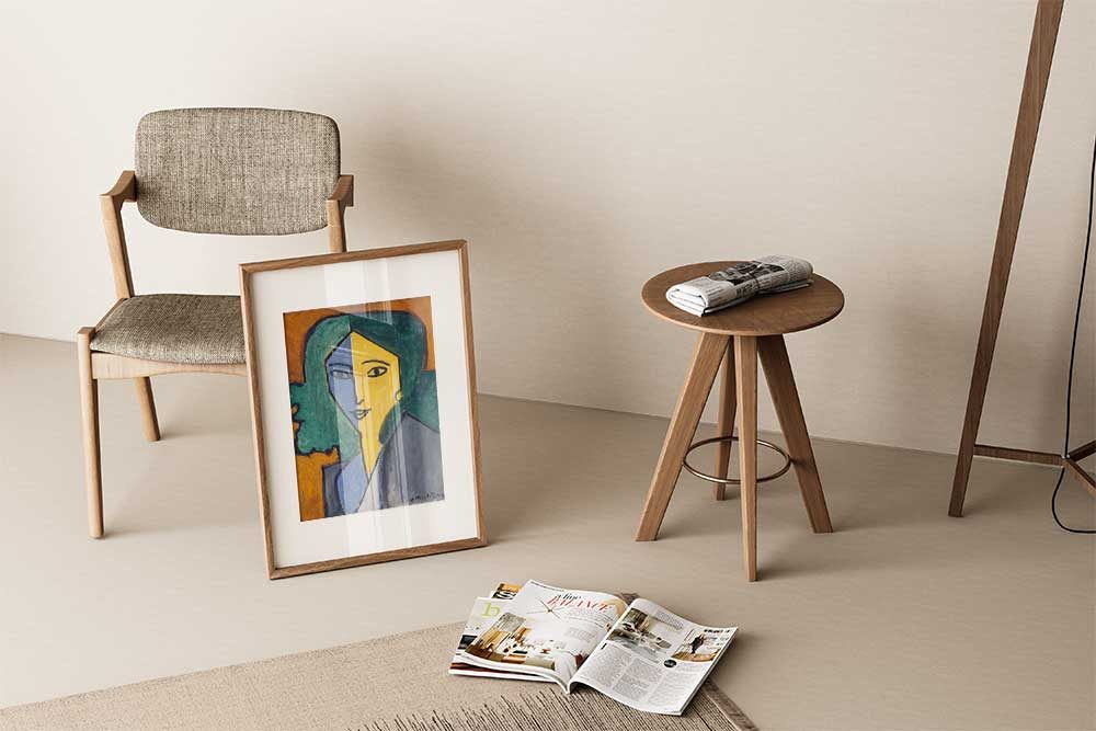 Vintage travel poster wall art in modern living room